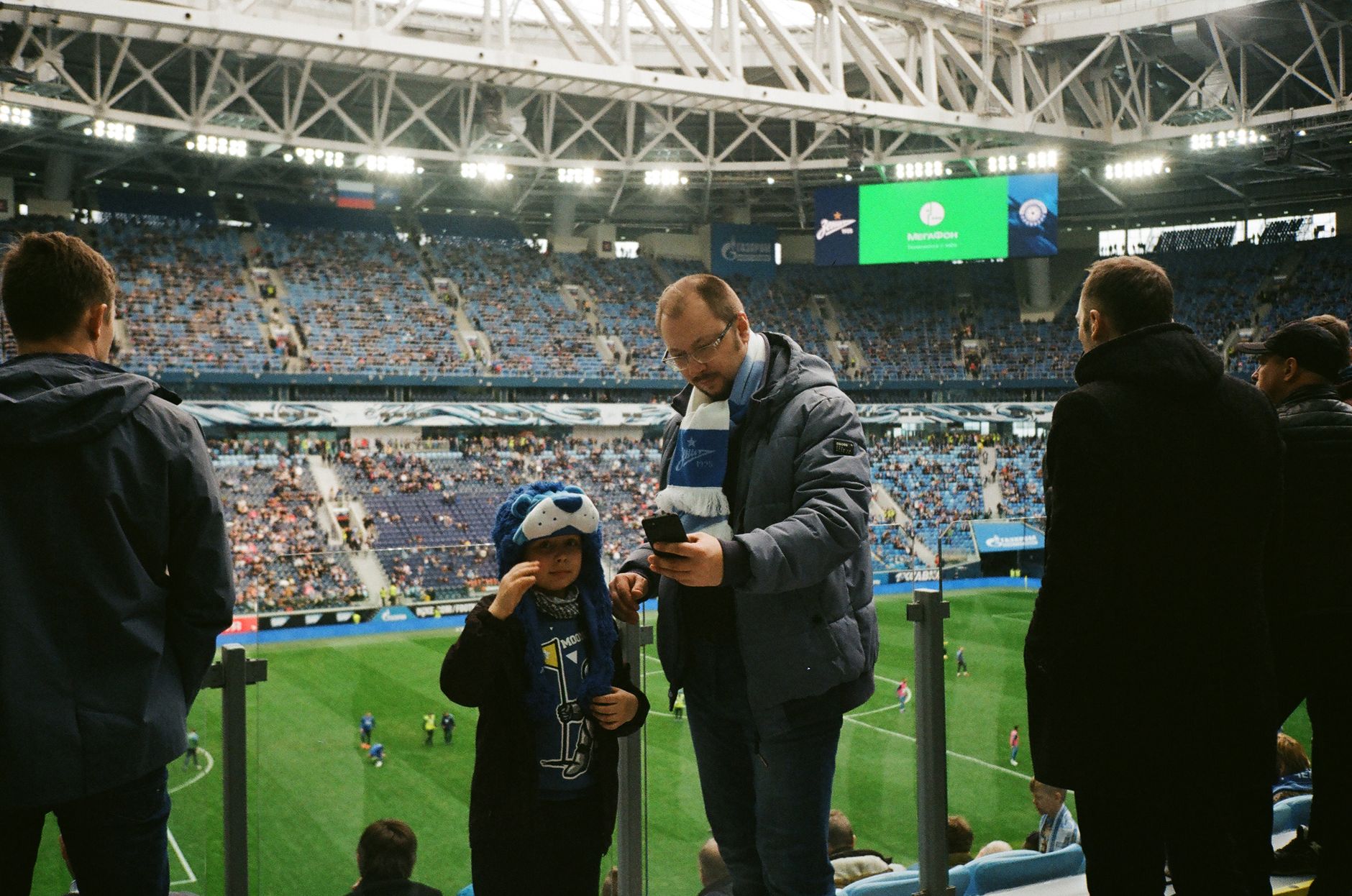 Crowd enjoying a football match in Saint Petersburg stadium, Russia.